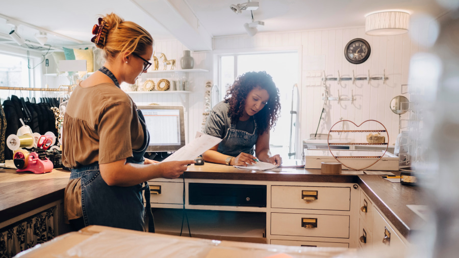 Two female colleagues working in their studio